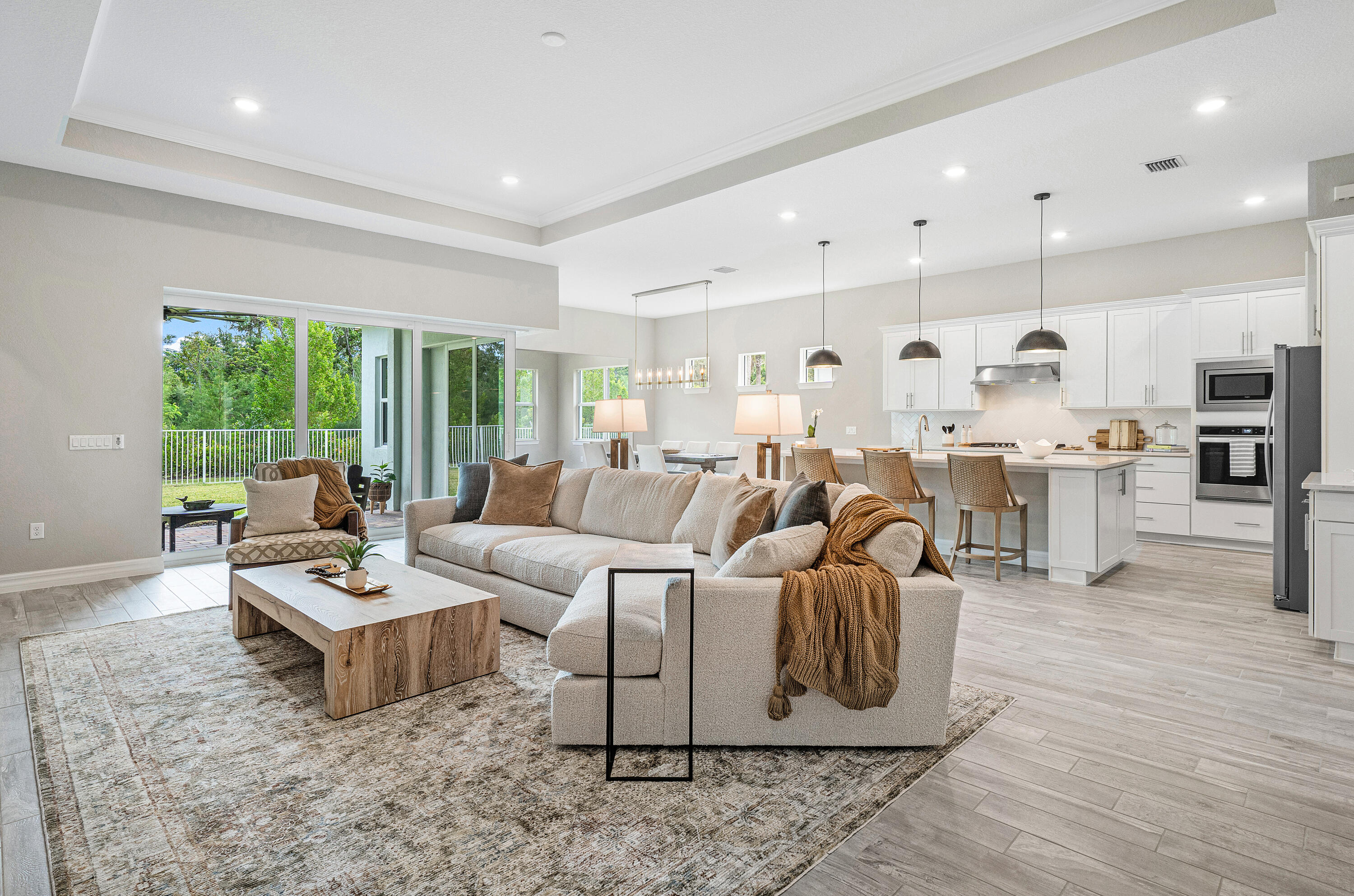 5312 Blue Reed Ln. Lake Worth, FL 33467 - Photo 4 of 10 a living room with furniture and a large window