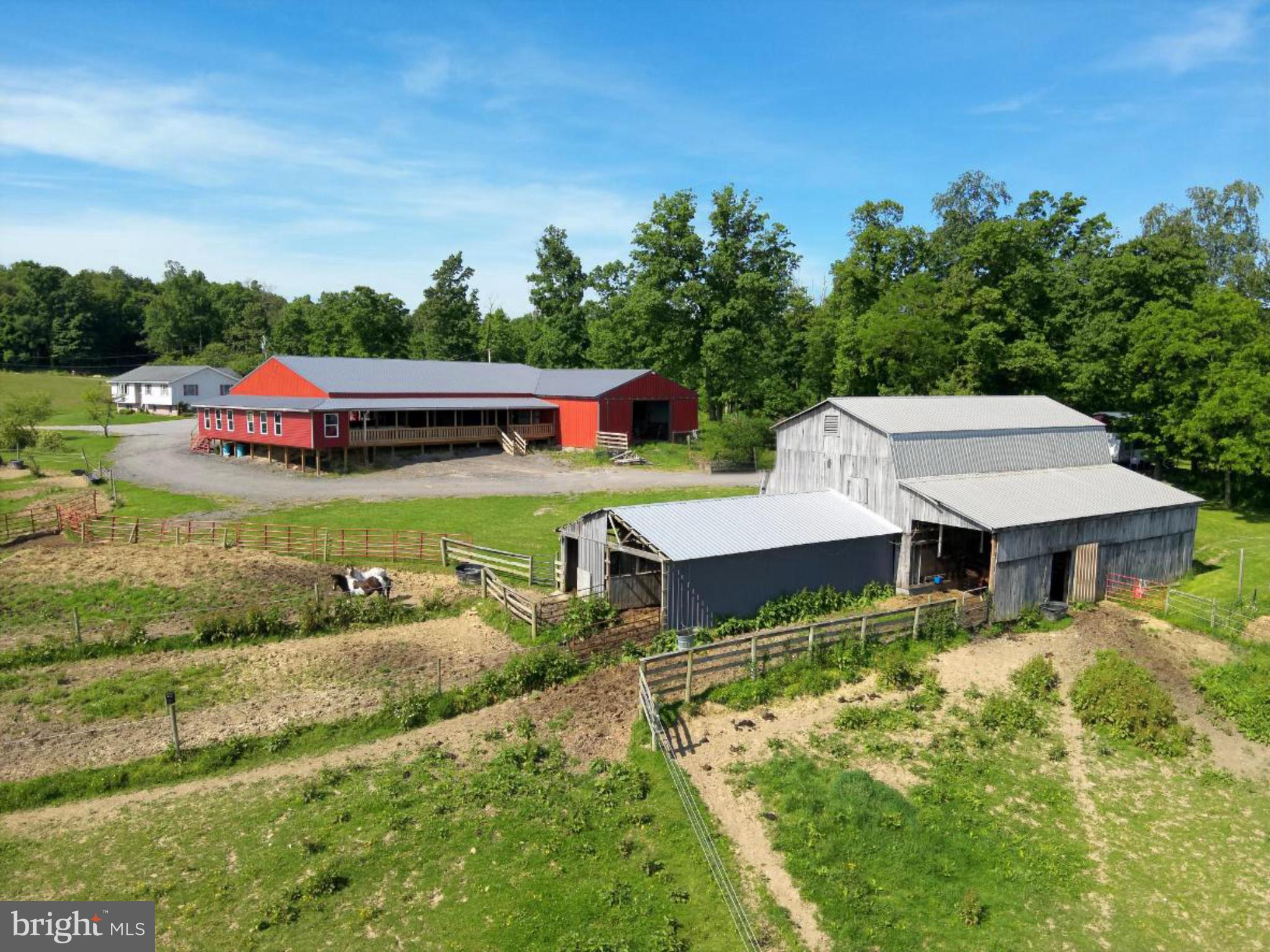 301 Dinkenberger Road Kingwood, WV 26537 - Photo 39 of 57 a aerial view of a house with swimming pool garden and patio