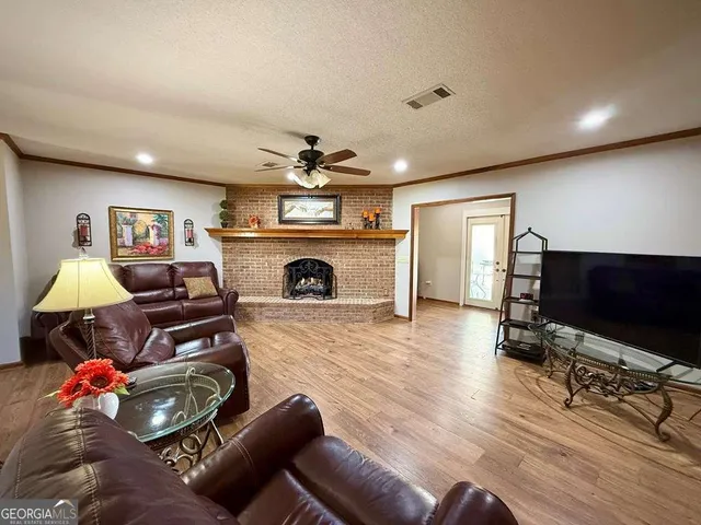 a kitchen with a stove and a refrigerator