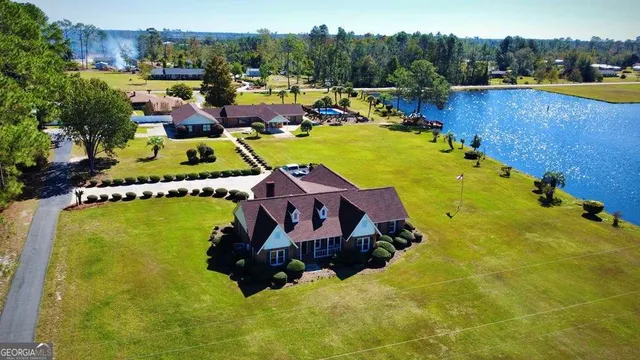 a front view of house with an outdoor space and seating