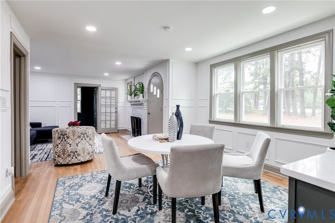 14000 Westfield Road Midlothian, VA 23113 - Photo 15 of 49 Dining room featuring a decorative wall, a brick f