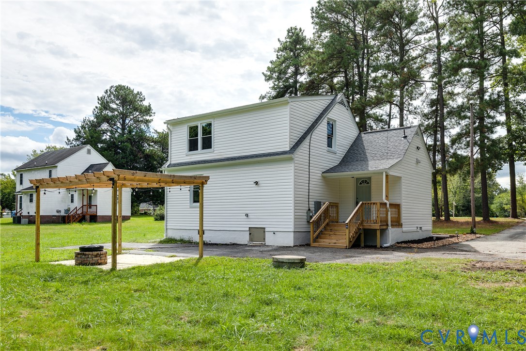 14000 Westfield Road Midlothian, VA 23113 - Photo 46 of 49 Rear view of house with a patio area, a yard, a fi