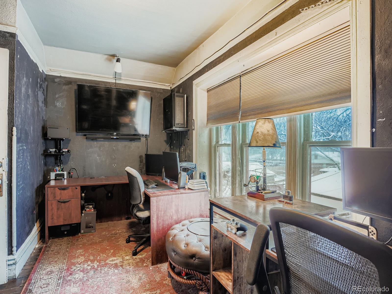 2516 North Marion Street Denver, CO 80205 - Photo 25 of 31 a view of a dining room with furniture window and outside view