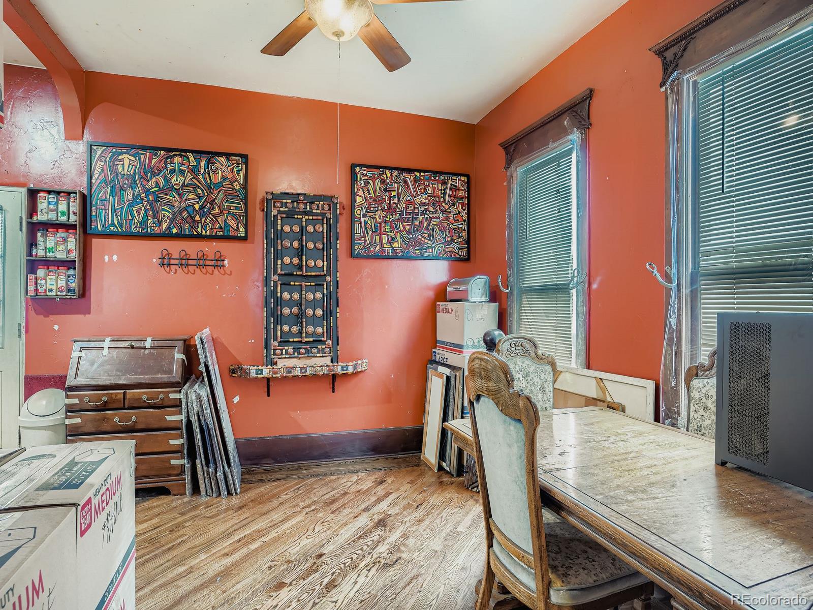 2516 North Marion Street Denver, CO 80205 - Photo 29 of 31 a view of a room with furniture and wooden floor