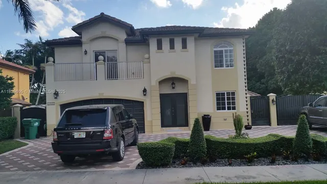 a car parked in front of a house