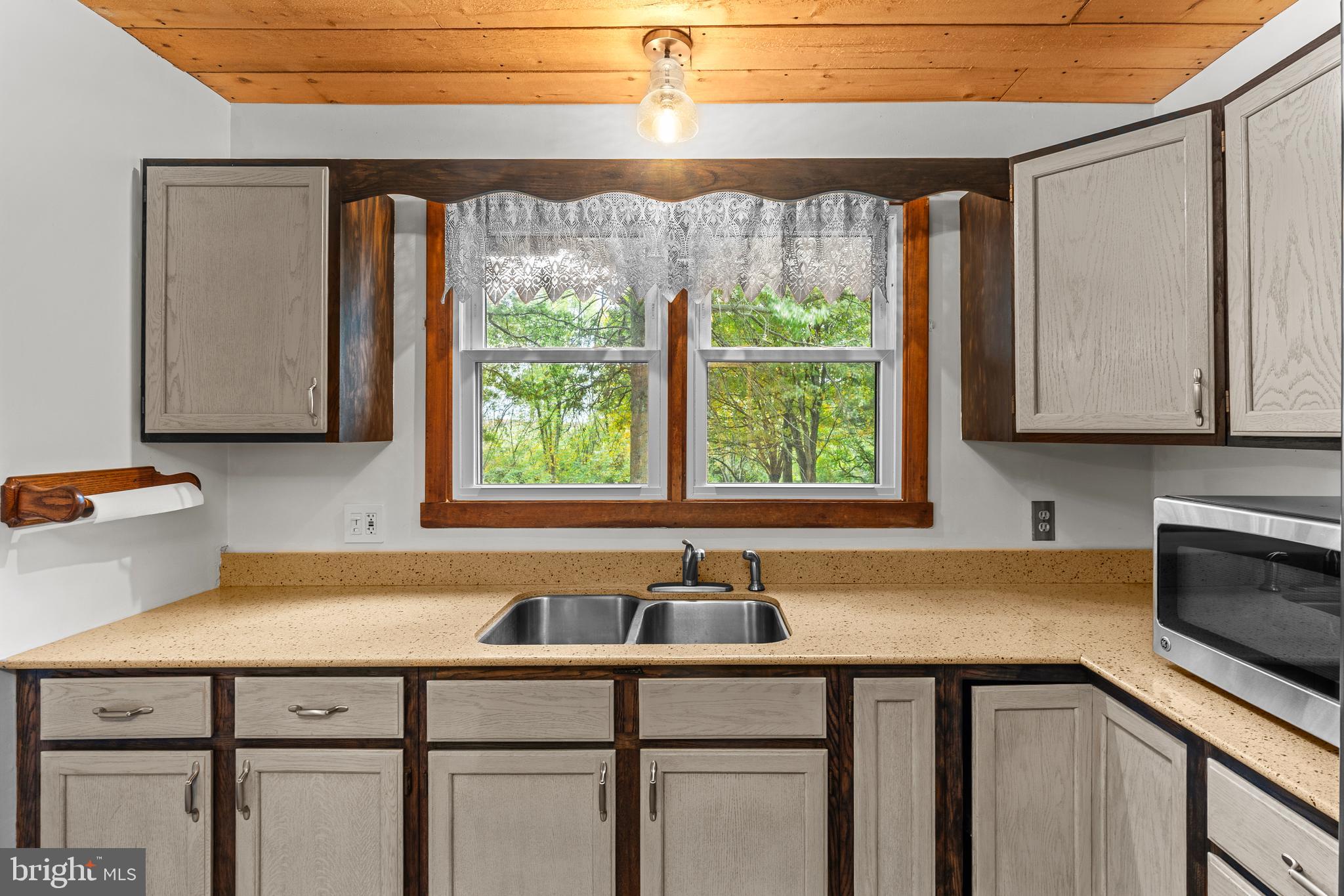 1003 Jackson Hall School Road Elkton, MD 21921 - Photo 22 of 49 a kitchen with a sink and a window
