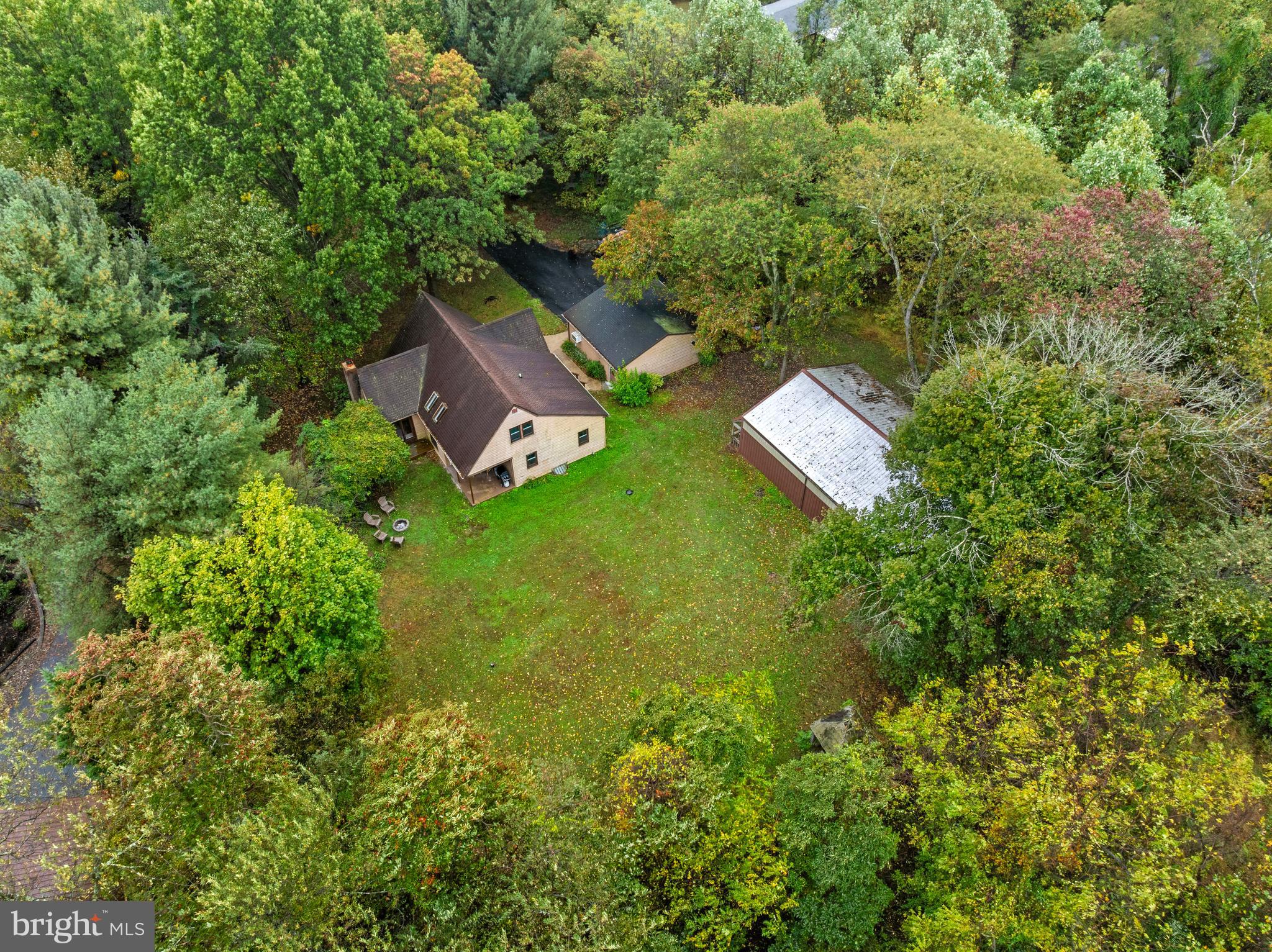 1003 Jackson Hall School Road Elkton, MD 21921 - Photo 9 of 49 an aerial view of residential house with outdoor space and trees all around