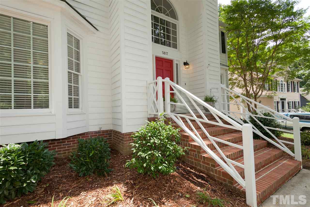 5817 Raddington Street Raleigh, NC 27613 - Photo 2 of 25 a house with trees in front of it