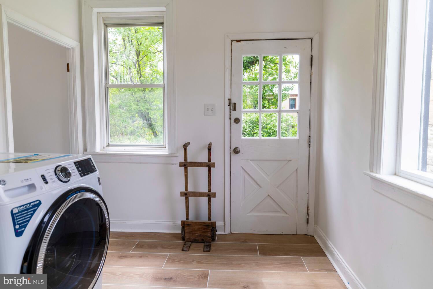 28 East Johnson Street Philadelphia, PA 19144 - Photo 10 of 24 a view of entryway with washer and dryer