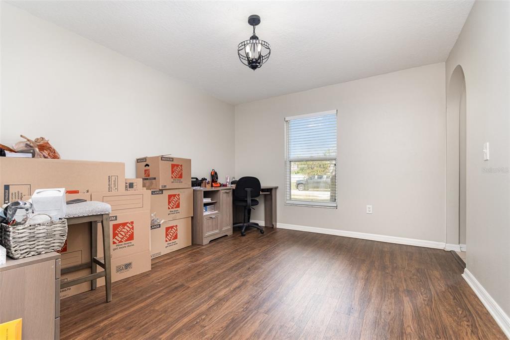 149 Circle Hill Road Sanford, FL 32746 - Photo 19 of 30 a room with furniture and a window