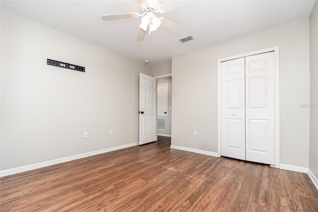 149 Circle Hill Road Sanford, FL 32746 - Photo 26 of 30 a view of an empty room with wooden floor