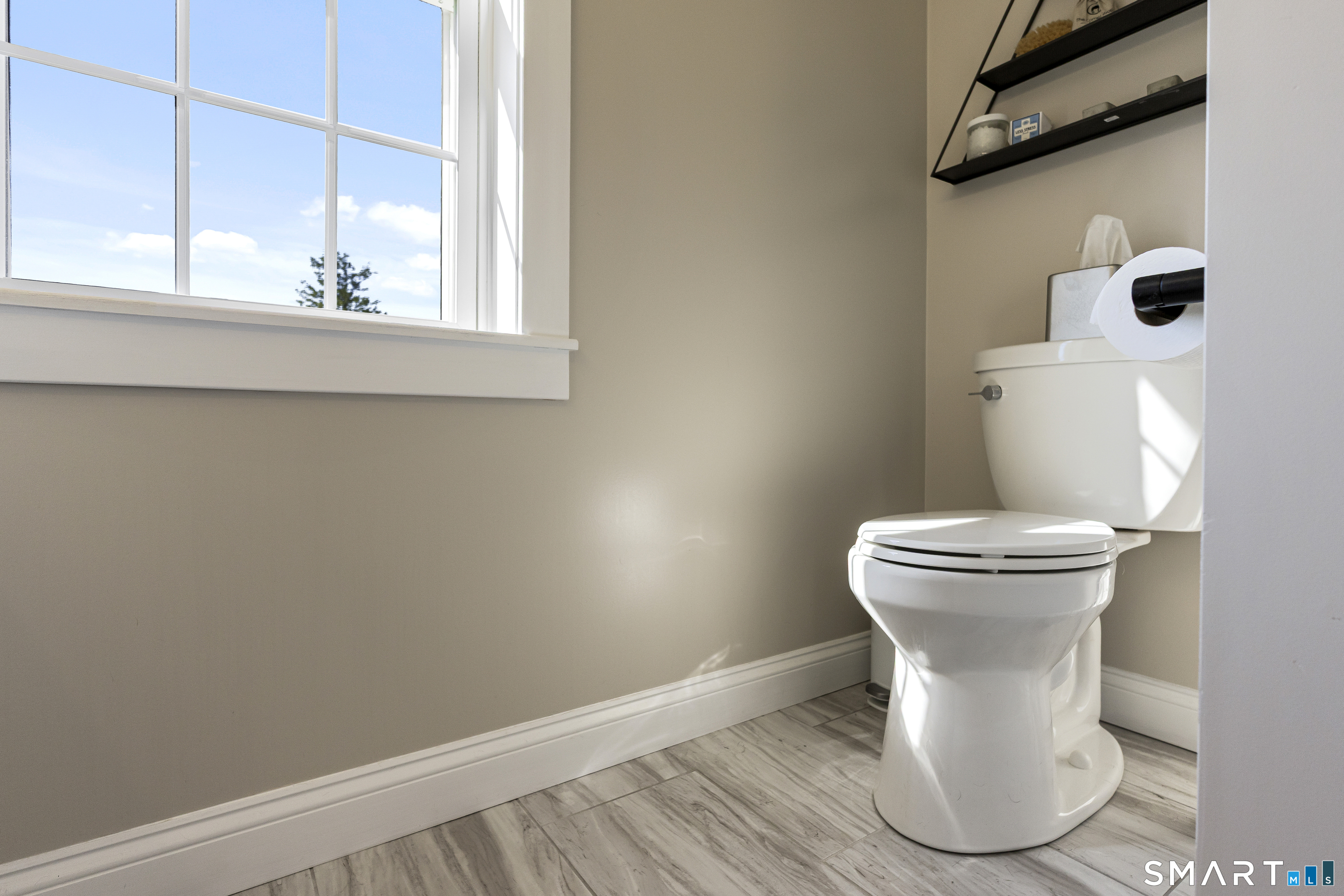 29 Beecher Road Brooklyn, CT 06234 - Photo 35 of 40 a white toilet sitting next to a window