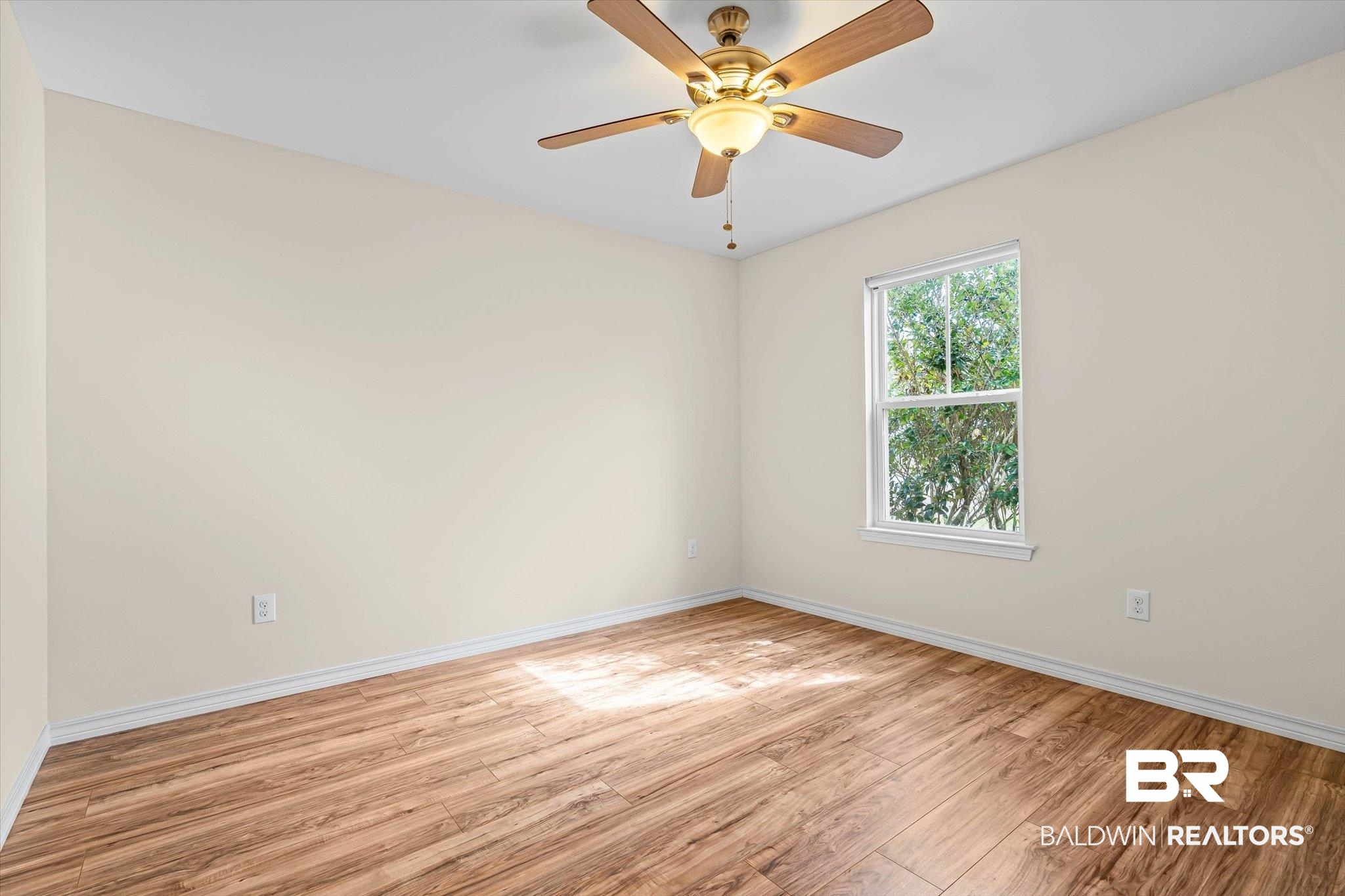 919 Sailor Circle Foley, AL 36535 - Photo 18 of 24 Unfurnished room featuring light wood-type flooring and a ceiling fan