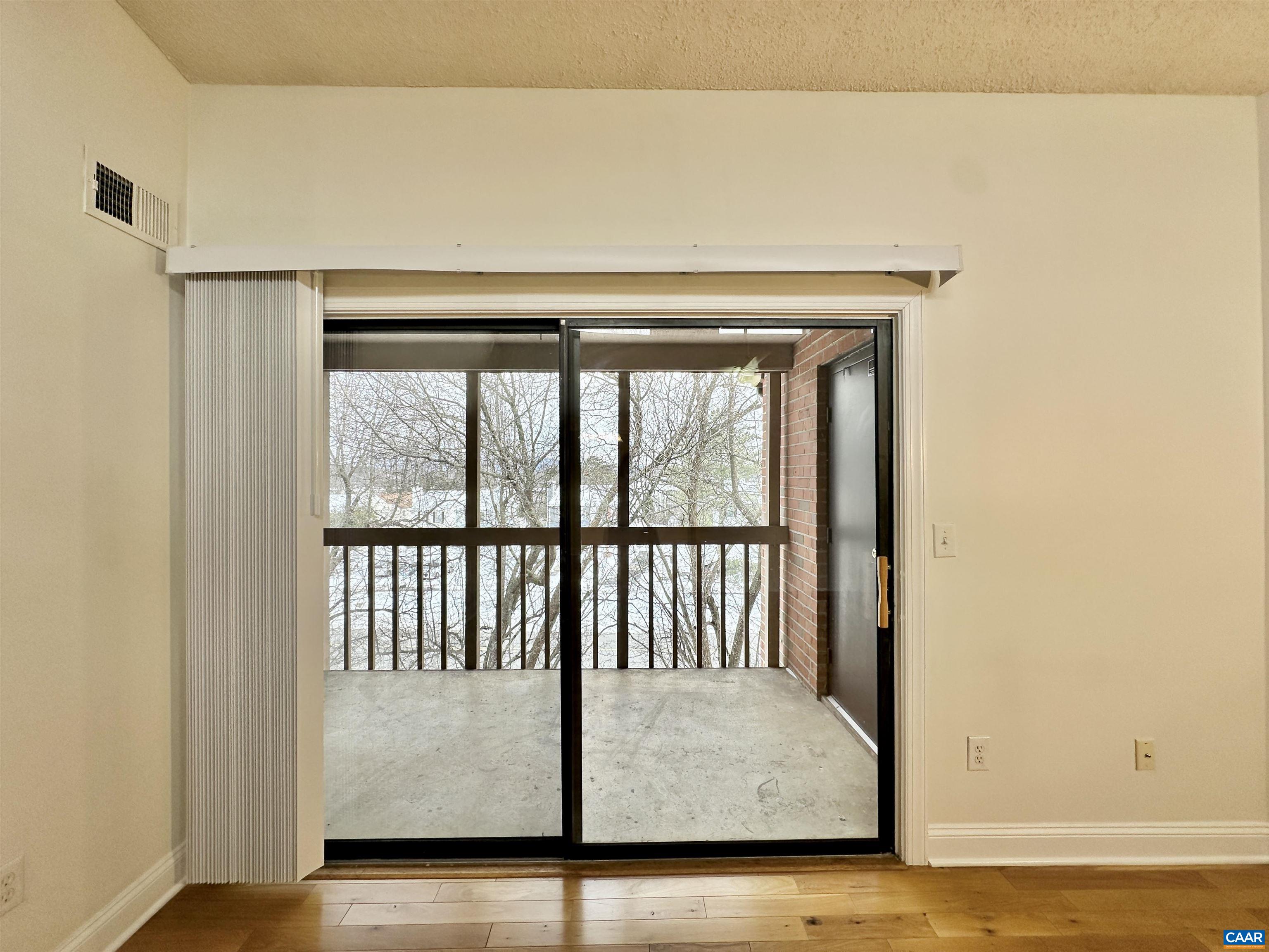 139 Green Turtle Lane, Unit 10 Charlottesville, VA 22901 - Photo 11 of 26 Sliding door to porch
