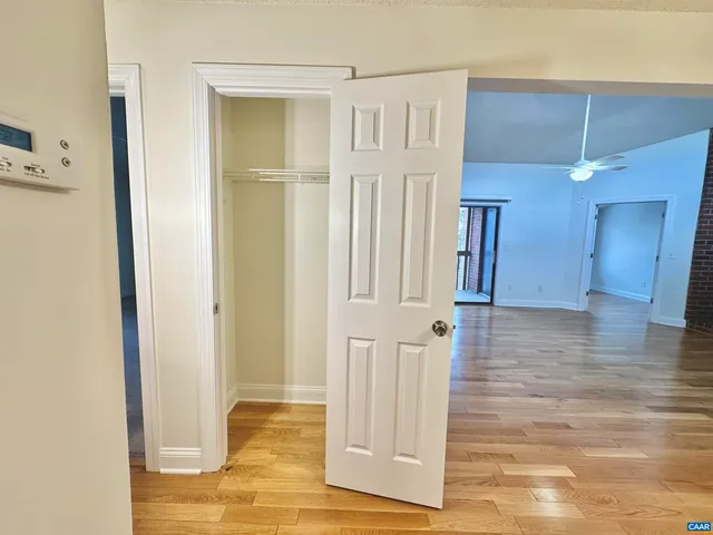 a view of a livingroom with wooden floor