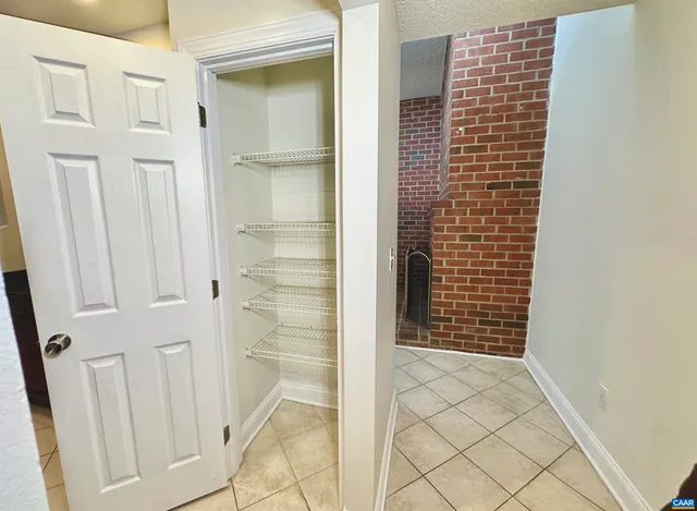 a view of a door and a window