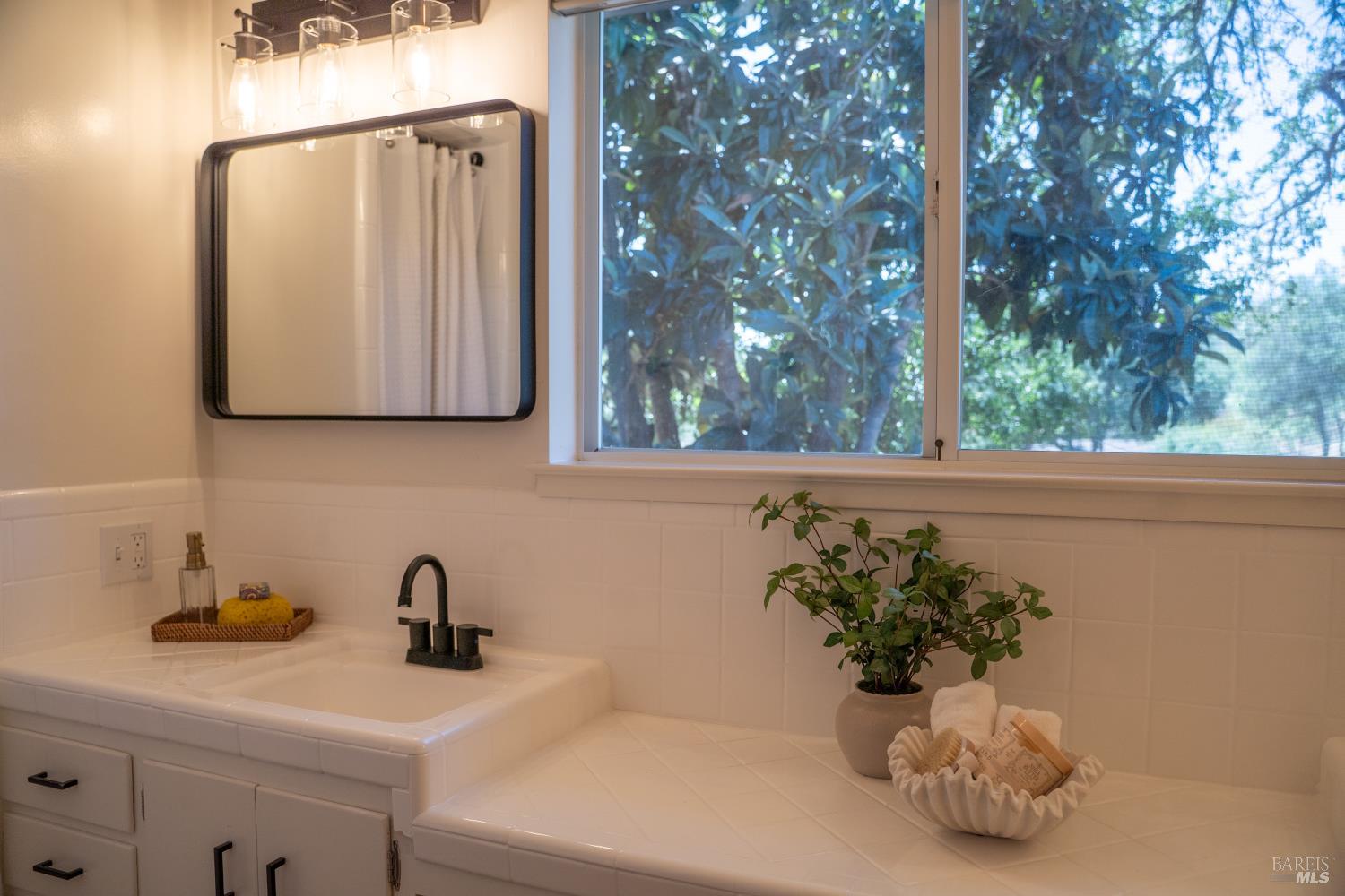 750 Deer Park Road St. Helena, CA 94574 - Photo 16 of 32 Primary bathroom with double sinks