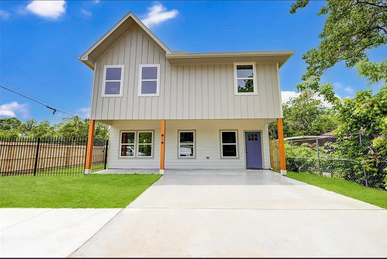 8361 Tate Street Houston, TX 77028 - Photo 13 of 16 a front view of house with yard and green space