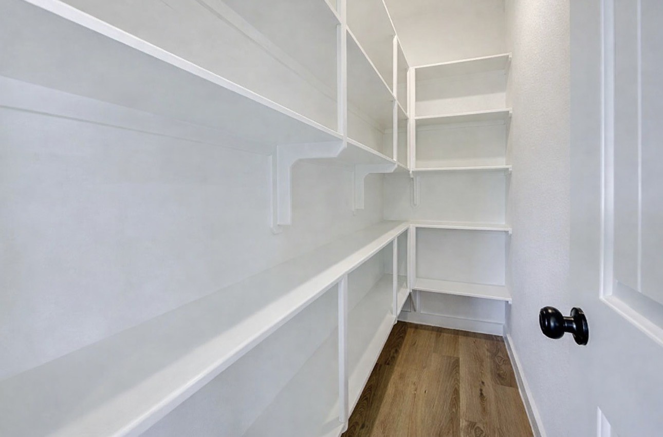 8361 Tate Street Houston, TX 77028 - Photo 3 of 16 a view of a walk in closet