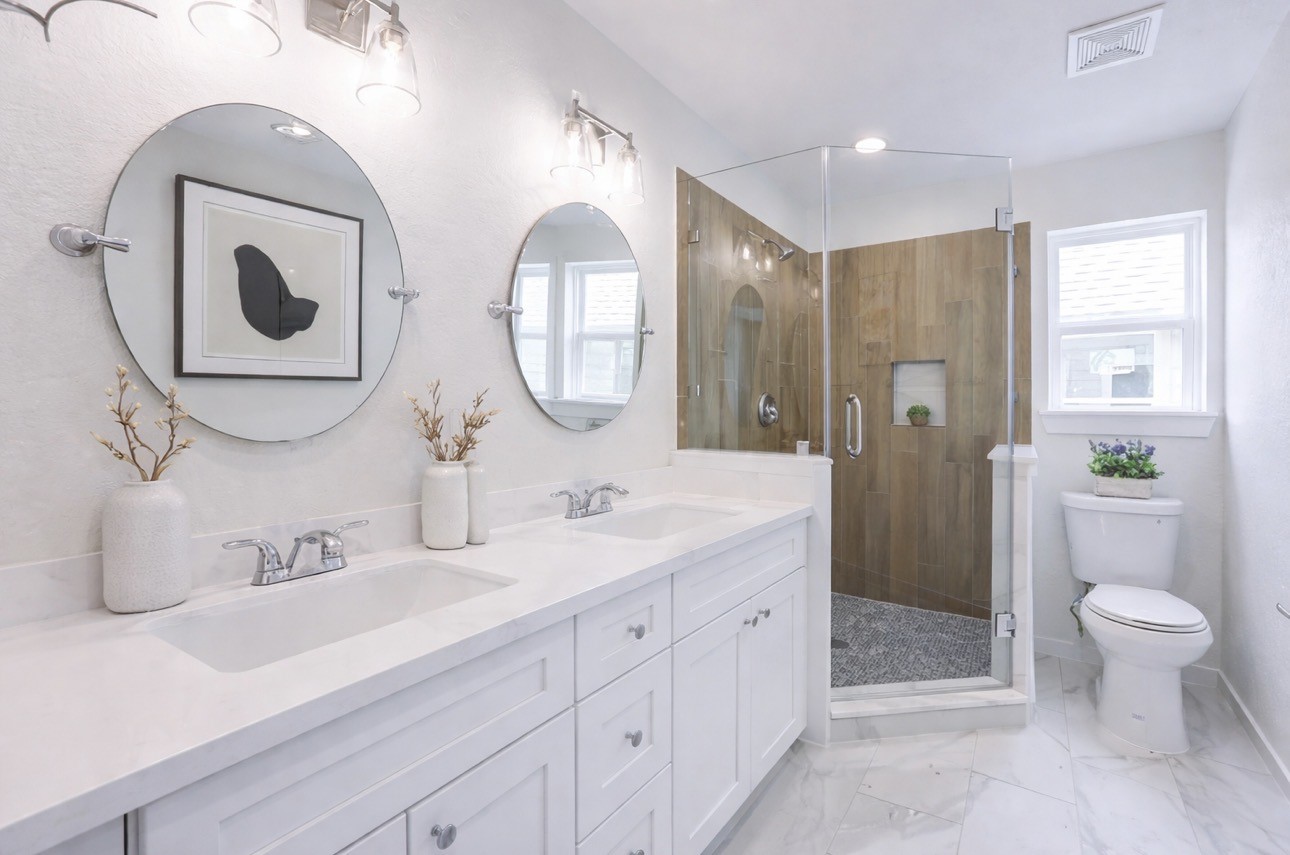 8361 Tate Street Houston, TX 77028 - Photo 9 of 16 a spacious bathroom with a granite countertop sink mirror and toilet