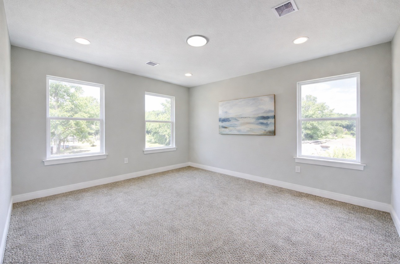 8361 Tate Street Houston, TX 77028 - Photo 10 of 16 a view of an empty room with a window