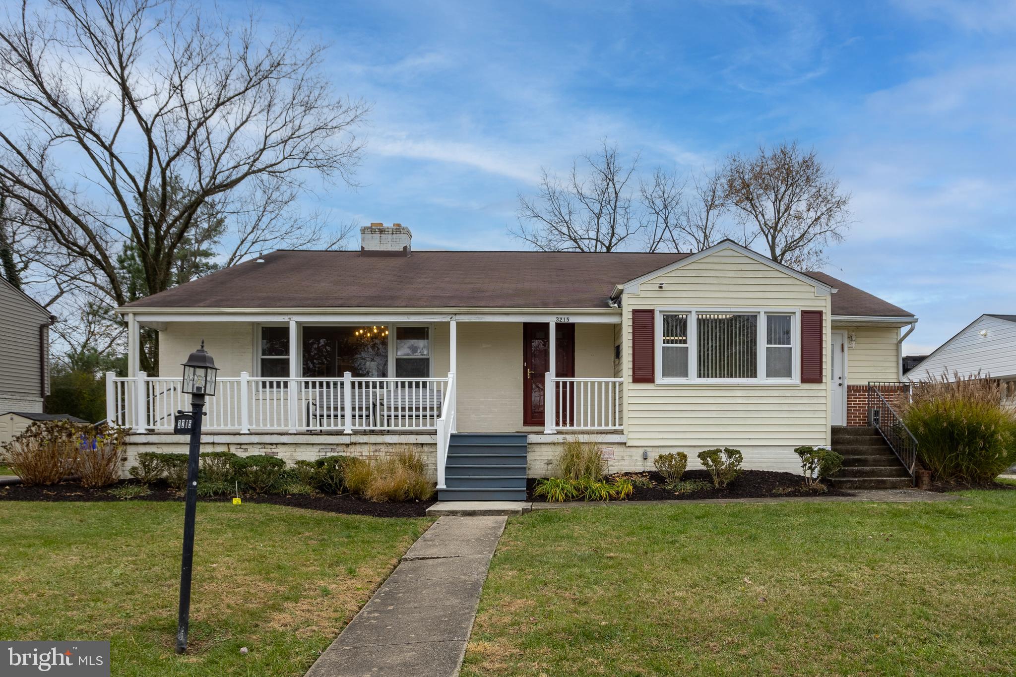 3215 Northbrook Road Baltimore, MD 21208 - Photo 1 of 48 a front view of a house with a yard