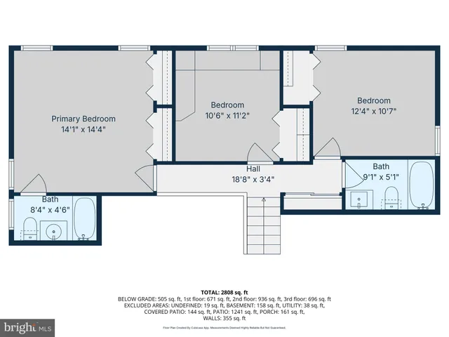 a bedroom with a bed and cabinets