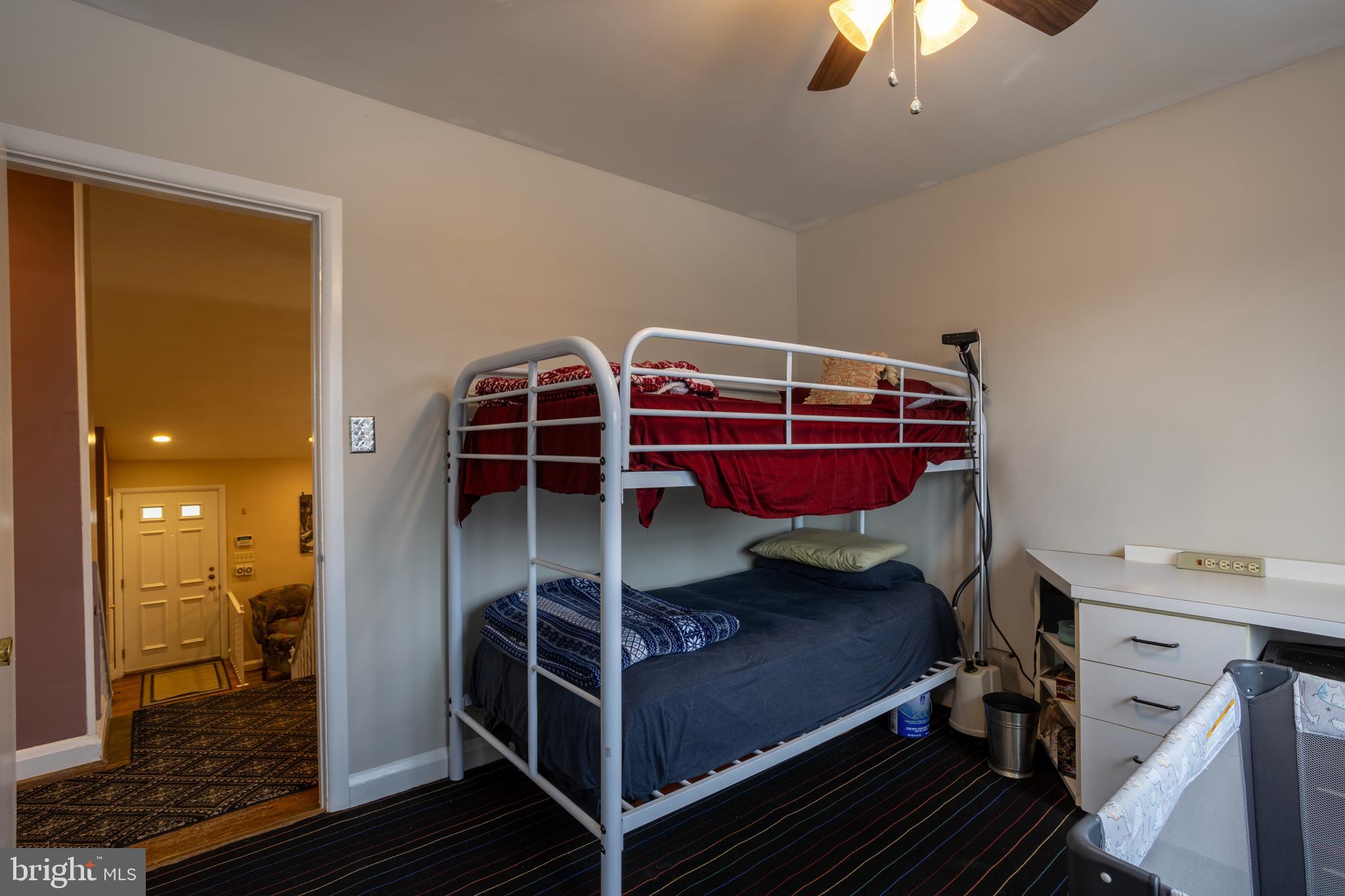 3215 Northbrook Road Baltimore, MD 21208 - Photo 24 of 48 a bedroom with a bed and a mirror