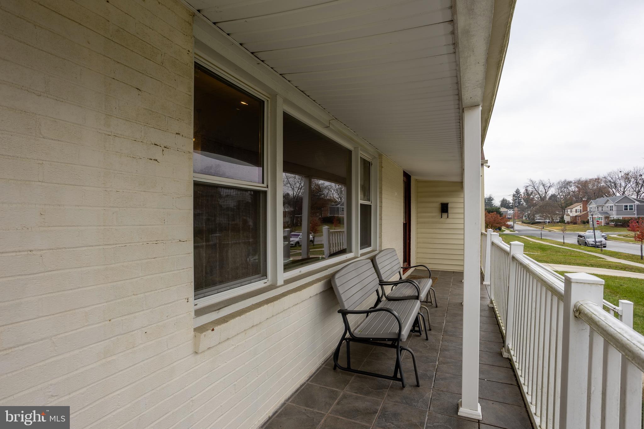 3215 Northbrook Road Baltimore, MD 21208 - Photo 4 of 48 a view of a balcony with chair and table