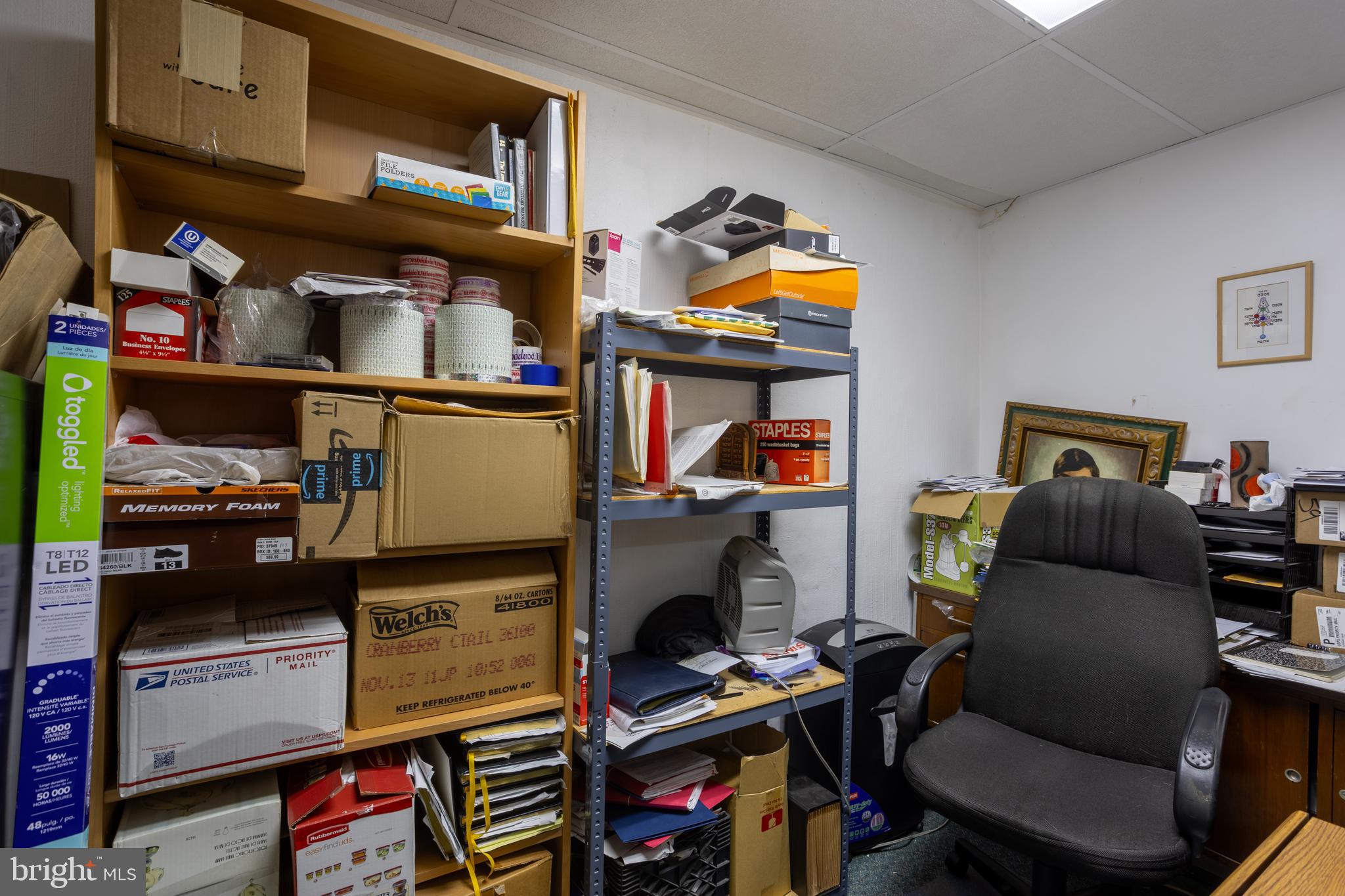 3215 Northbrook Road Baltimore, MD 21208 - Photo 41 of 48 a living room with furniture and a fireplace