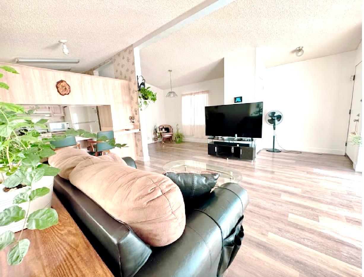 55 Pacifica Avenue, Unit 90 Bay Point, CA 94565 - Photo 7 of 12 a room with a bed and a flat screen tv