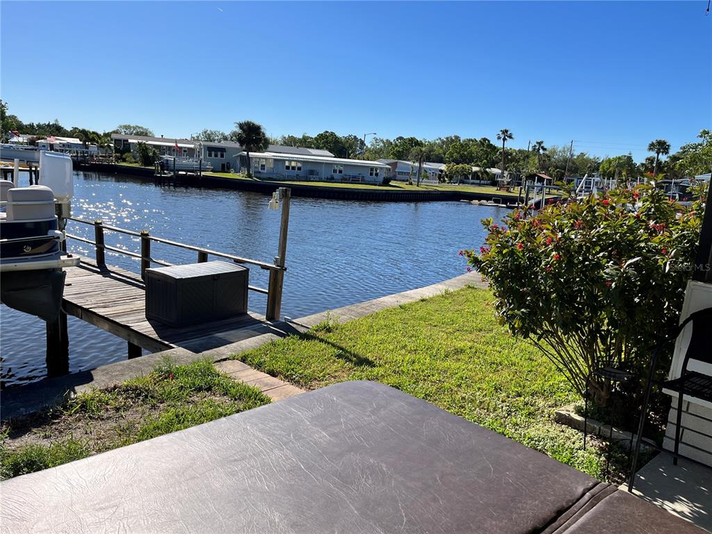 6803 Mt Pleasant Road Northeast, Unit 33 St. Petersburg, FL 33702 - Photo 4 of 28 a view of a lake with a mountain in the background