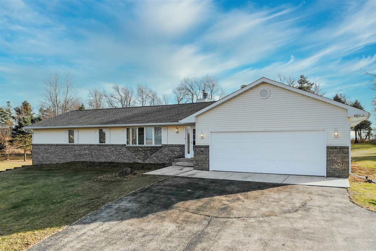 7290 Stephens Road Rockton, IL 61072 - Photo 1 of 30 a view of a house with a backyard