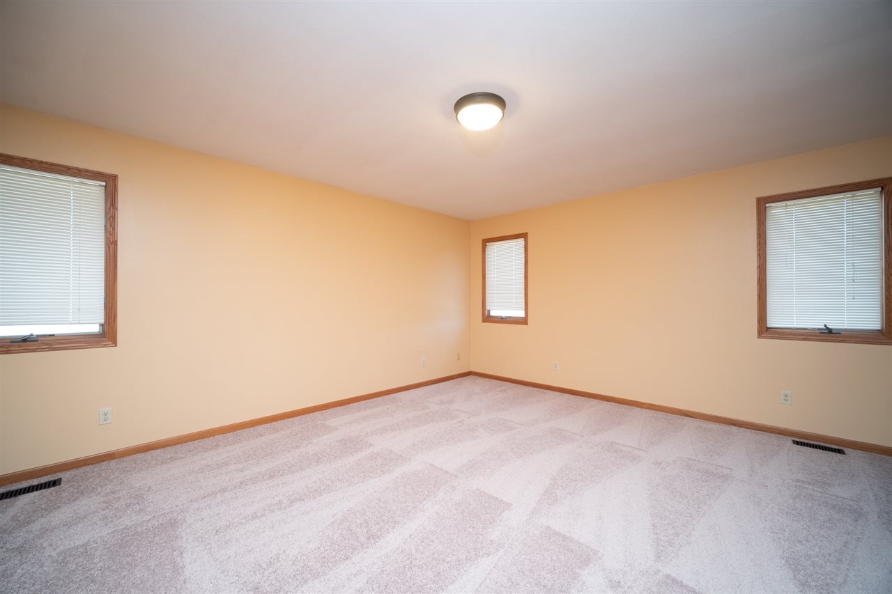 7290 Stephens Road Rockton, IL 61072 - Photo 15 of 30 an empty room with a window