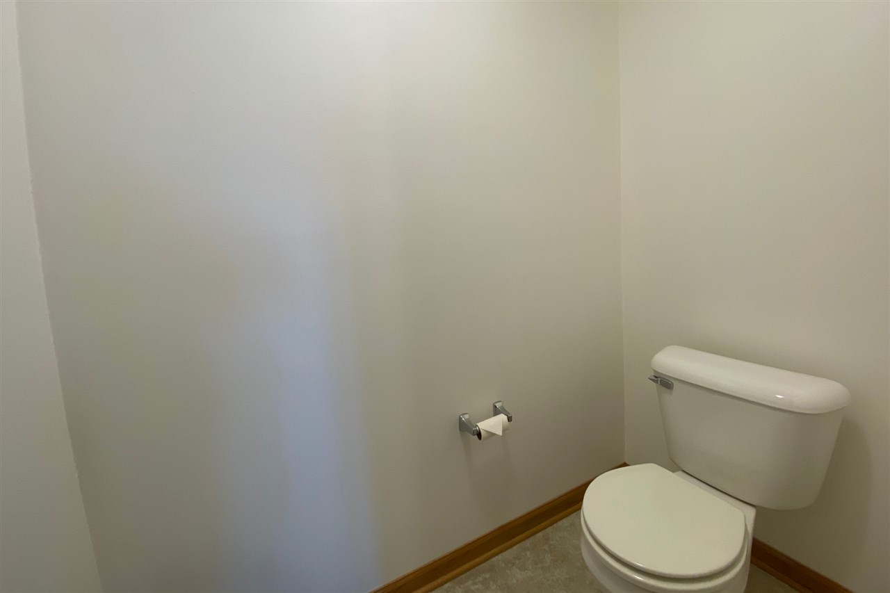 7290 Stephens Road Rockton, IL 61072 - Photo 18 of 30 a white toilet sitting next to a white wall
