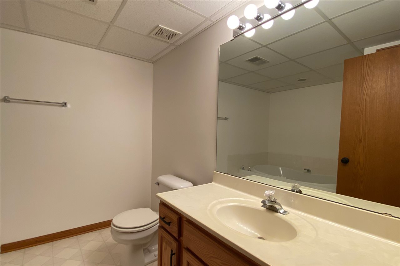 7290 Stephens Road Rockton, IL 61072 - Photo 27 of 30 a bathroom with a sink toilet and vanity