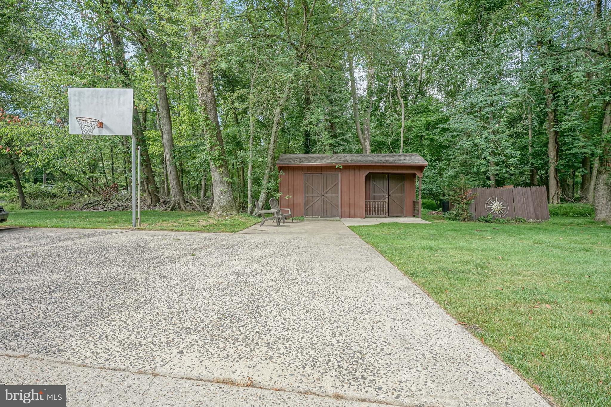 53 Cooper Tomlinson Road Medford, NJ 08055 - Photo 77 of 77 Driveway Hoops Area & Shed.