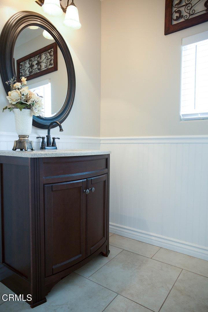 40775 Cheyenne Trail Cherry Valley, CA 92223 - Photo 15 of 21 a bathroom with a sink and a mirror