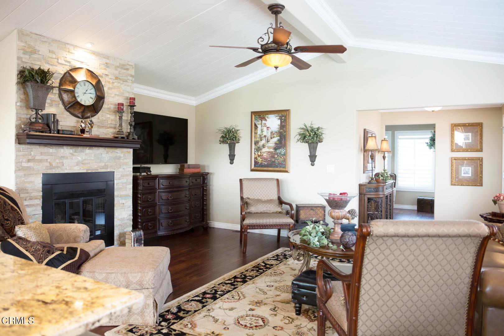 40775 Cheyenne Trail Cherry Valley, CA 92223 - Photo 4 of 21 a living room with furniture and a fireplace
