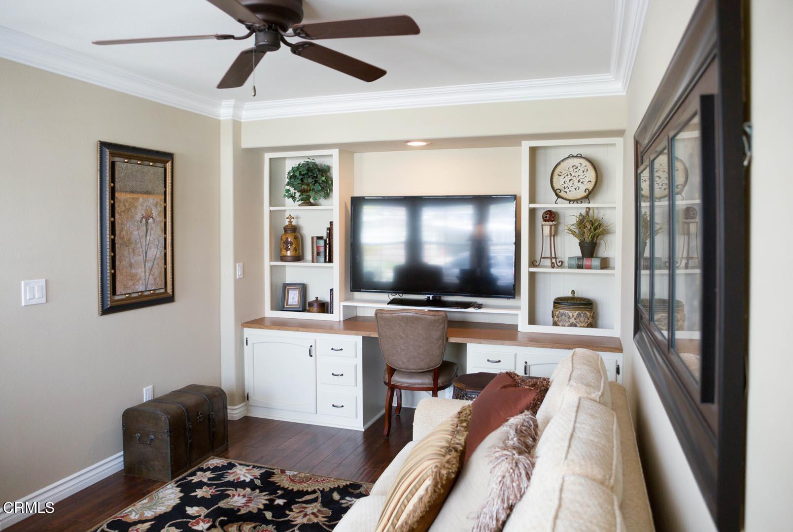 40775 Cheyenne Trail Cherry Valley, CA 92223 - Photo 5 of 21 a living room with furniture and a flat screen tv
