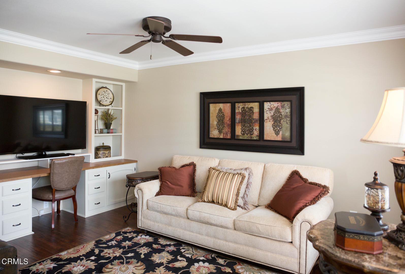 40775 Cheyenne Trail Cherry Valley, CA 92223 - Photo 6 of 21 a living room with furniture and a flat screen tv