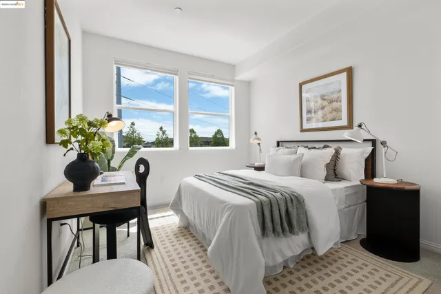 a hallway with a washer and dryer