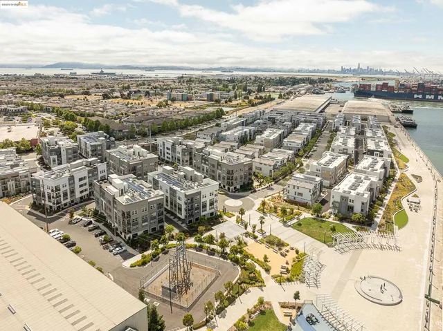 an aerial view of residential building and parking space
