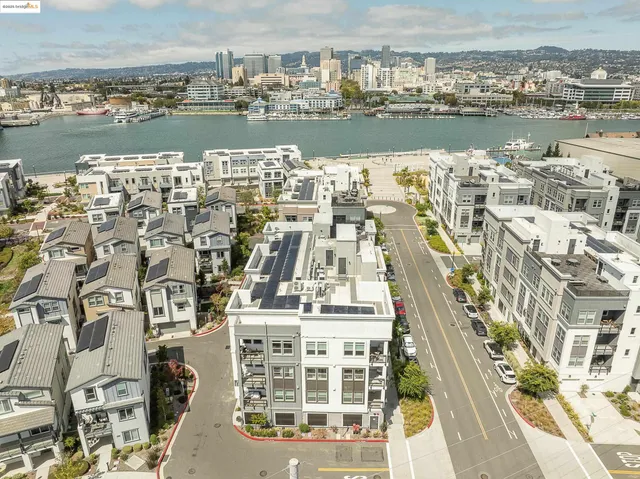 a view of a city with an ocean view