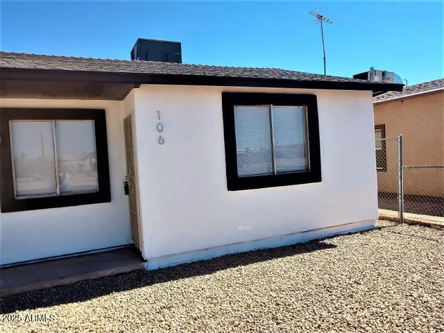 a front view of a house with windows