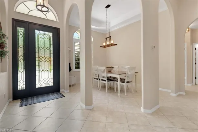 a view of a livingroom with furniture and a window