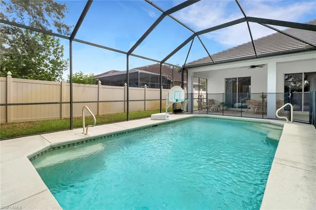 a patio with table and chairs