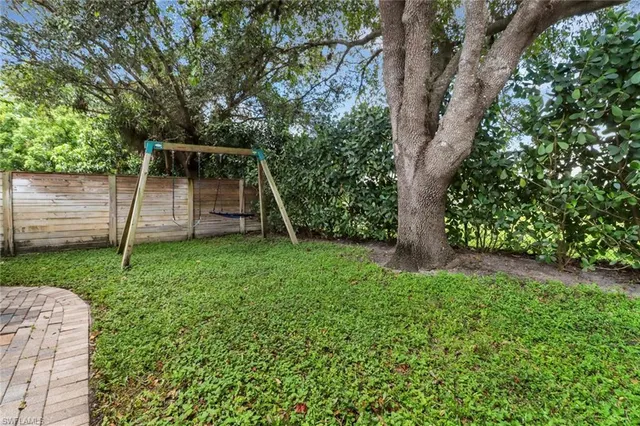 a backyard of a house with entertaining space