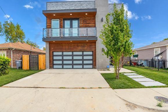 3610 Vilbig Road Dallas, TX 75212 - Photo 1 of 29 Modern exterior with wood-finish siding and a flat roofline