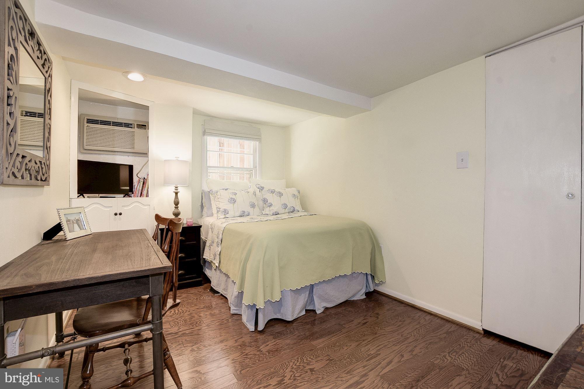 2011 Kalorama Road Northwest, Unit 1 Washington, DC 20009 - Photo 9 of 15 Bedroom 2 with built-ins and wood floors